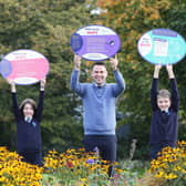 Rosemount Primary School, Derry pupils Saoirse Schlindwein (10) and her brother Franz (11) with school numeracy co-ordinator Conor Quinn, celebrate Maths Week 2021.