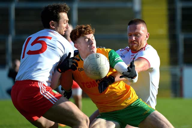Sean Dolan’s Ruaidhri McGurk and Gearoid McDermott grapple with Desertmartin’s Lachlan Murray during the JFC Final in Celtic Park on Saturday afternoon last. (Photo: George Sweeney). DER2143GS – 111