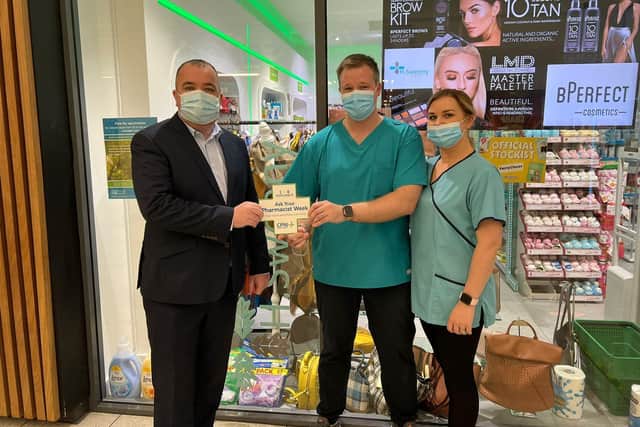 Pictured is SDLP Councillor Brian Tierney visiting a local pharmacy.