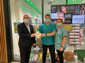 Pictured is SDLP Councillor Brian Tierney visiting a local pharmacy.