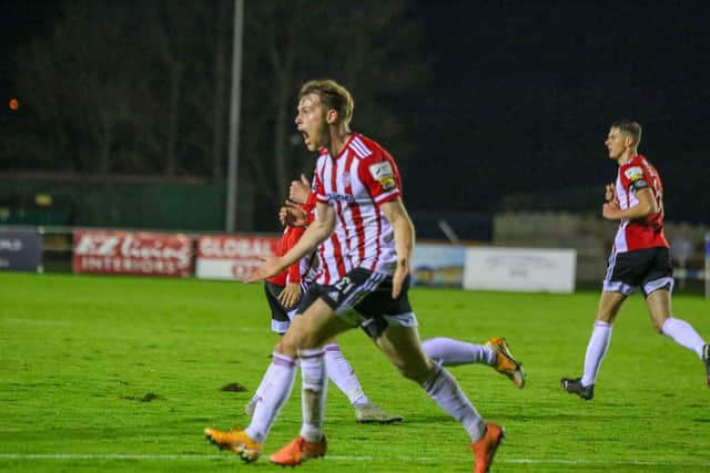 Derry City's Cameron McJannet races away celebrating their last minute equaliser, at Waterford. Picture by Kevin Moore/MCi