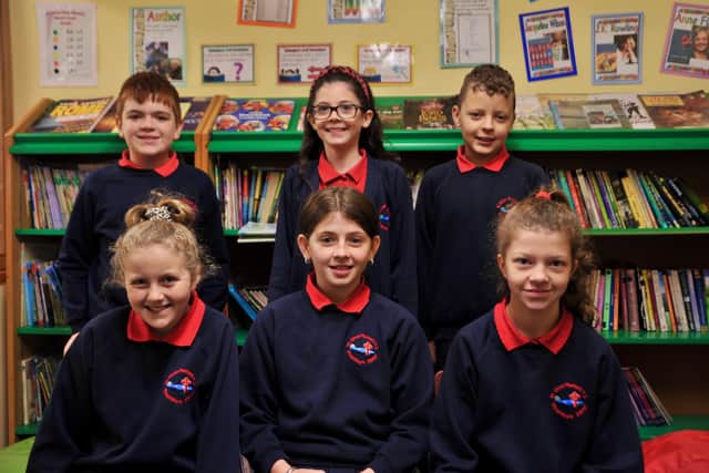 Pupils in St Oliver Plunkett's Primary School. 
Front row (L-R): Claragh, Tiegan & Sophie
Back Row: Jack, Hannah & Phillip