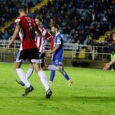 Cameron McJannet celebrates his 93rd minute equaliser in Waterford. Photograph by Kevin Moore.