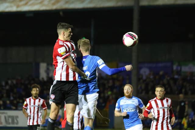 Derry City centre-back Eoin Toal out-jumps Finn Harps' Ryan Rainey to get this header in during Friday night's encounter at Finn Park. Picture by Kevin Moore/MCi