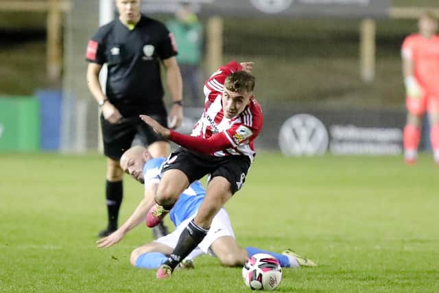 Derry City's Joe Thomson skips away from Finn Harps midfielder Mark Coyle. Picture by Kevin Moore/MCI