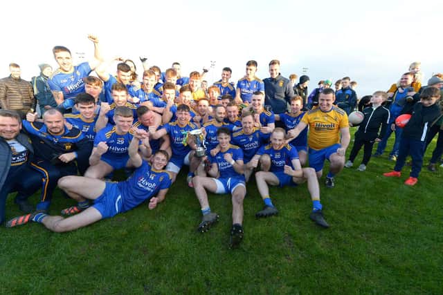 Steelstown players and management celebrate their Intermediate Championship success at Ballymaguigan. (Photo: George Sweeney)