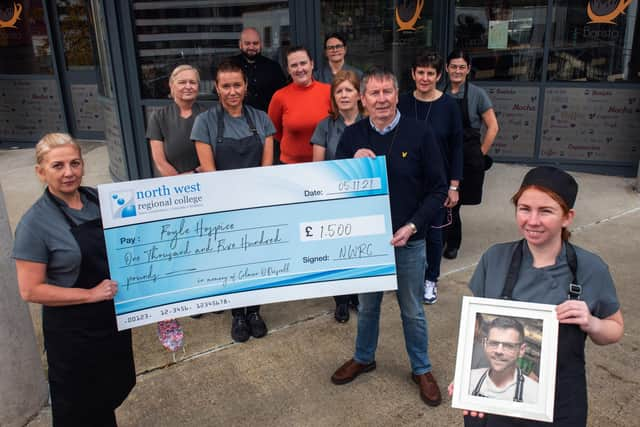 Hospitality and Catering staff from NWRC present a cheque for £1,500 to Noel McMonagle, Foyle Hospice, in memory of Colman O’Driscoll. (Picture Martin McKeown).