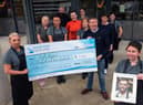 Hospitality and Catering staff from NWRC present a cheque for £1,500 to Noel McMonagle, Foyle Hospice, in memory of Colman O’Driscoll. (Picture Martin McKeown).