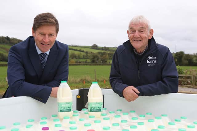 Brian Lynch, Area Sales Manager for Dale Farm (left) pictured with Robert Kincaid (Right) Dale Farm milkman celebrating 50 years of deliveries.