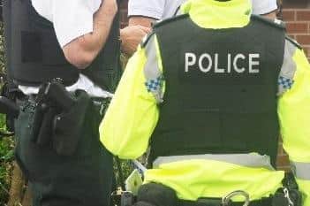 Police confirm searches and arrest.