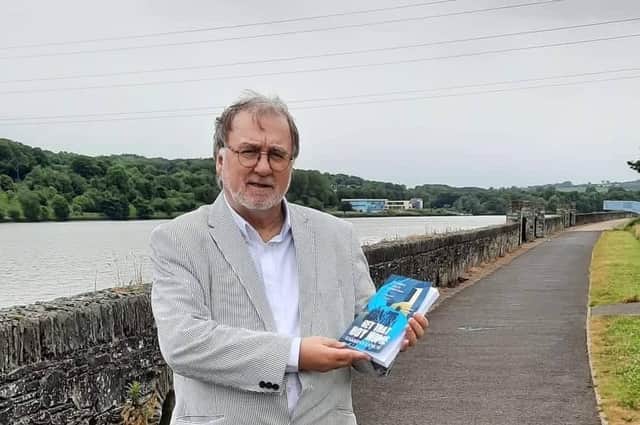 Eamonn Lynch, with his new book.
