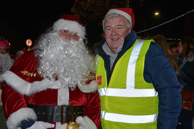 Councillor Nicholas Crossan pictured with Santa at the Christmas tree lights switch on held in Market Square, Buncrana in 2019.