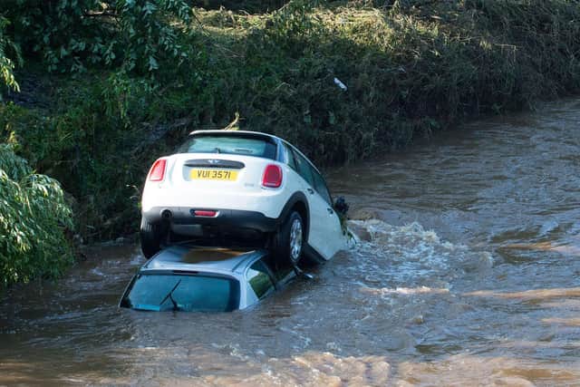 Pacemaker Press 23/8/2017 
Cars swept into the River Faughan, As Torrential rain has led to localised flooding and disruption throughout parts of Northern Ireland.
Heavy rain and flashfloods swept across the region on Tuesday evening.

Pic Pacemaker