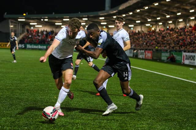 Derry City's Junior Ogedi-Uzokwe tussles with Sligo Rovers Lewis Banks. Picture by Kevin Moore/MCi