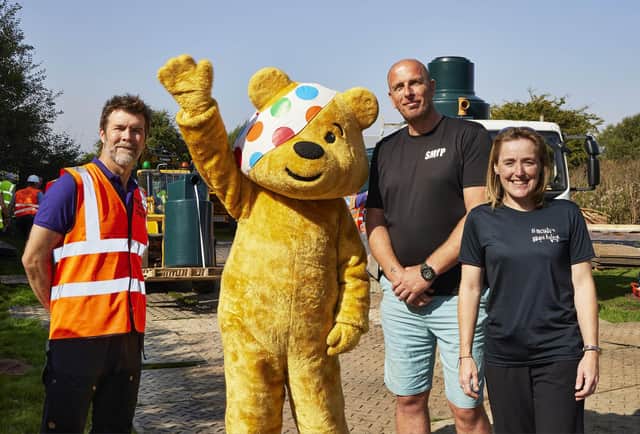 Rhod Gilbert with Pudsey and Matt Rogers and Jo Lorenz from St Michael's Youth Project