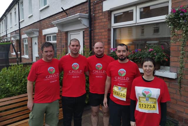 Liam Wallace, Odhran Logue, Caomhan Logue, Caolan Logue, Colleen Tiernay who ran the Belfast marathon on behalf of CHILD