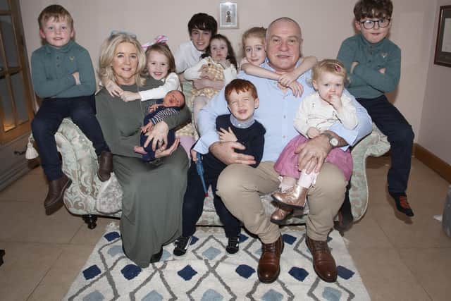 John Jennings, pictured on the occasion of his retirement with wife Annette and grandchildren - Sean Jennings, Annette Jennings, Lily-May McLoone, Baby Cillian McLoone, Conor McLoone, Georgia McLoone, Ruaidhrí Jennings, Anna Jennings, John Jennings, Fiadh Jennings and Fionn Jennings.