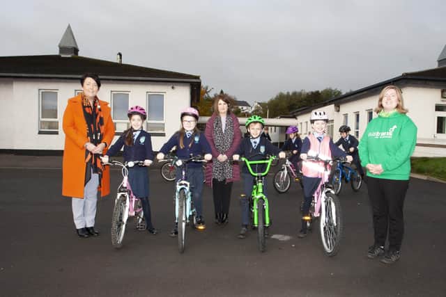CYCLE SKILLS AT HOLLYBUSH PS. . . . .Primary 5 pupils from Hollybush Primary School who took part in this weekâ€TMs Cycle Skills and Bike Fixing programme, in conjunction with the North West Greenway Network and Sustrans. From left, Ms Teresa Duggan, Principal, Anna Dobbins, Darah Bradley, Mrs Sinead McGurren, Teacher, Harry Connolly, Fionnuala Thompson and Cat Brogan, Sustrans Officer. (Photos: Jim McCafferty Photography)