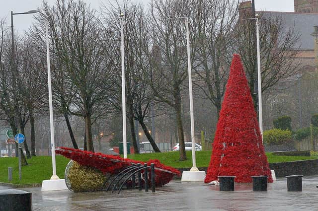 2020: Christmas decorations on Foyle Embankment upended during the strong winds and rain brought by Storm Brendan. DER0220GS – 006