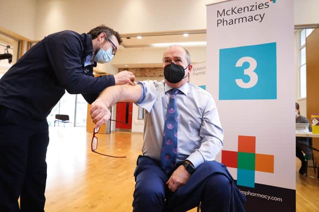 Chief Medical Officer Professor Michael McBride pictured getting his booster vaccine this week.  Photo by Kelvin Boyes / Press Eye.