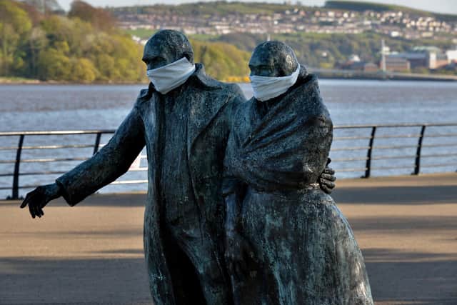 The emigration statues on Queen’s Quay. DER1720GS - 019