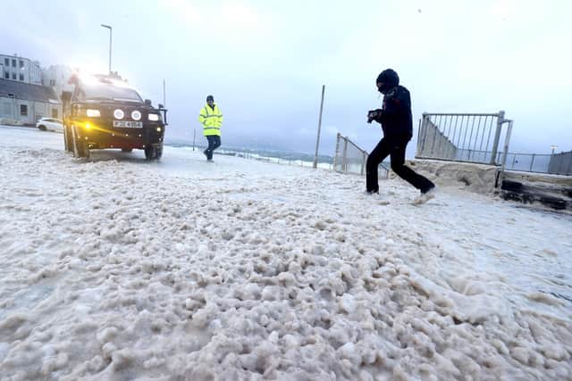 Storm Arwen hit the north coast with fury recently, and galeforce winds splattered  ̃sea foam' all over Portstewart. Pic Steven McAuley/McAuley Multimedia