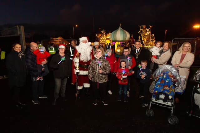 Derry City & Strabane District Council Mayor Graham Warke and his son Ollie pictured with Santa and Strabane Down Syndrome Support Group at the recent Christmas Lights Switch On. (Karol McGonigle)