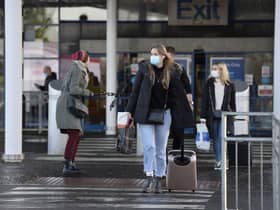 Passengers pictured previously at Belfast International Airport. (File picture: PressEye)