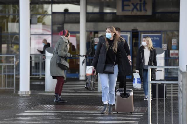 Passengers pictured previously at Belfast International Airport. (File picture: PressEye)