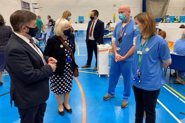 Robin Swann meeting local vaccination healthcare staff previously.