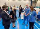 Robin Swann meeting local vaccination healthcare staff previously.