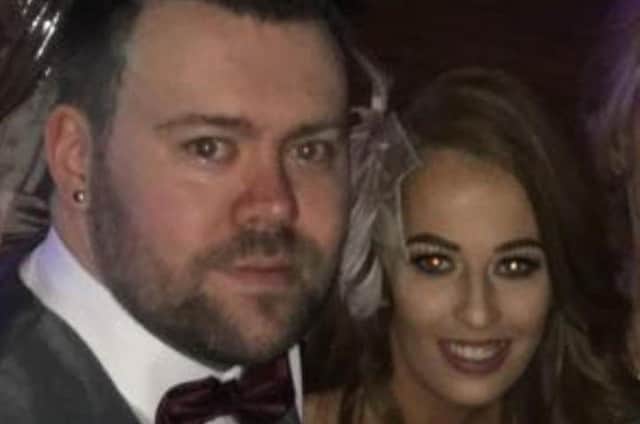 Adam and his partner, Emma.