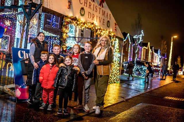 Laura Meehan (far right) and neighbour Emma Curran pictured with some of the children who are lucky enough to live on ‘Christmas Drive’.