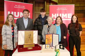 The Hume family pictured earlier this year with their late father’s peace prizes.