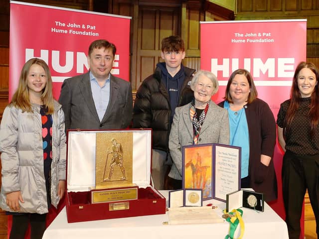 The Hume family pictured earlier this year with their late father’s peace prizes.