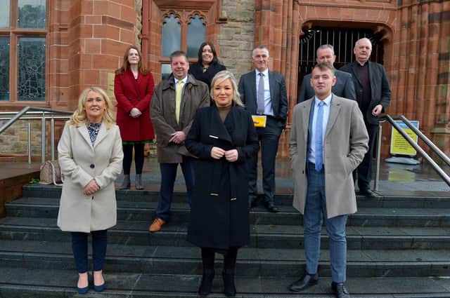 Deputy First Minister Michelle O’Neill pictured with Sinn Fein ministers , local MLAs and local councillors, outside the Guildhall on Wednesday morning, during a visit to Derry for a series of meetings. Included in the photograph are Ciara Ferguson MLA, Caoimhe Archibald MLA, Colr. Conor Heaney, Communities Minister Deirdre Hargey, Junior Minister Declan Kearney, Finance Minister Conor Murphy, Padraig Delargey MLA and Colr. Paul Fleming. Photo: George Sweeney. DER2149GS – 026
