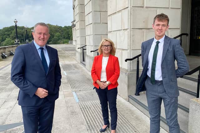 Finance Minister Conor Murphy with MLAs Ciara Ferguson and Pádraig Delargy