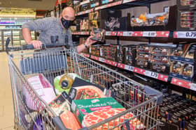 Connell Wilson winner of the Lidl Trolly Dash Competition at the Buncrana Road Store in Derry and collected  £263.02 worth of groceries.