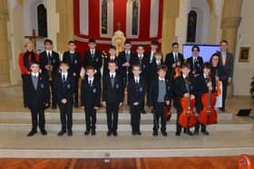 St Columb’s College’s Choir pictured at the school’s annual carol service held in St Patrick’s Church, Pennyburn, on Tuesday afternoon last.  Photo: George Sweeney.  DER2150GS – 006