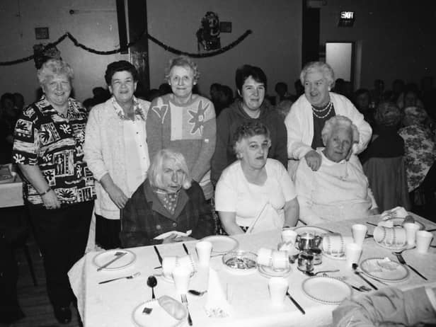 Senior citizens enjoying Christmas dinner in St. Mary’s parish hall in Creggan in December 1996.