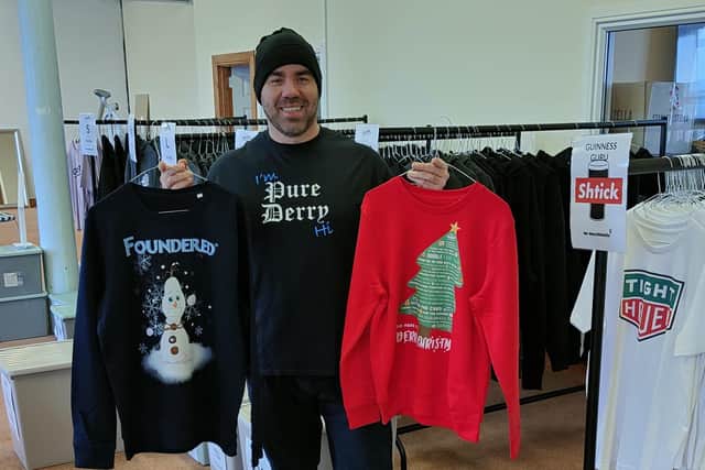 Ciarán Murray with Pure Derry Christmas jumpers.