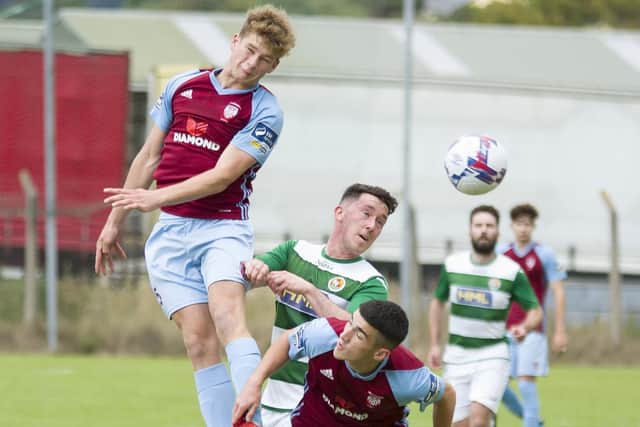 Former Derry City midfielder Mark McFadden (jumping) has signed for Institute.