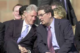 John Hume and Bill Clinton.