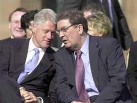 John Hume and Bill Clinton.