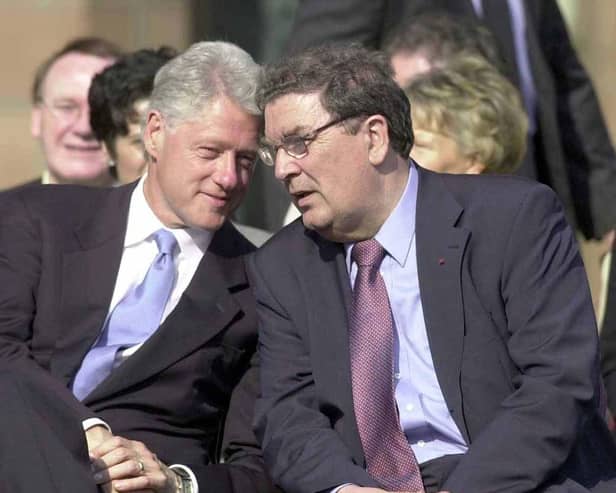 John Hume and Bill Clinton.