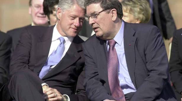 John Hume and Bill Clinton.