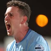 BACK ON THE GOAL TRAIL . . . .  David Parkhouse celebrates getting off the mark with Ballymena United with dramatic derby winner