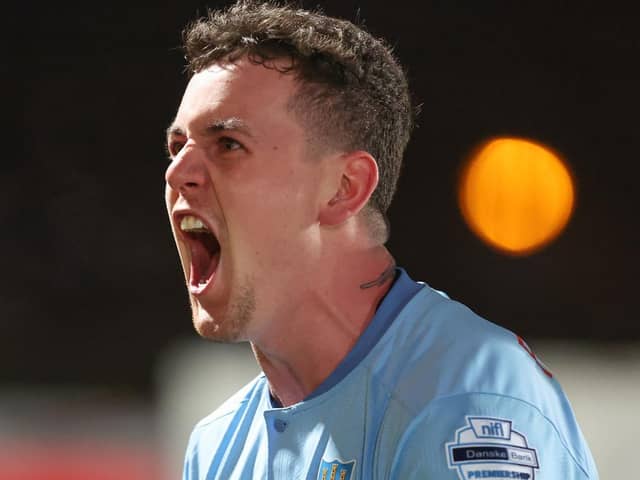 BACK ON THE GOAL TRAIL . . . .  David Parkhouse celebrates getting off the mark with Ballymena United with dramatic derby winner