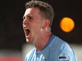 BACK ON THE GOAL TRAIL . . . .  David Parkhouse celebrates getting off the mark with Ballymena United with dramatic derby winner