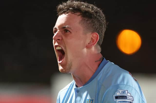BACK ON THE GOAL TRAIL . . . . David Parkhouse celebrates getting off the mark with Ballymena United with dramatic derby winner